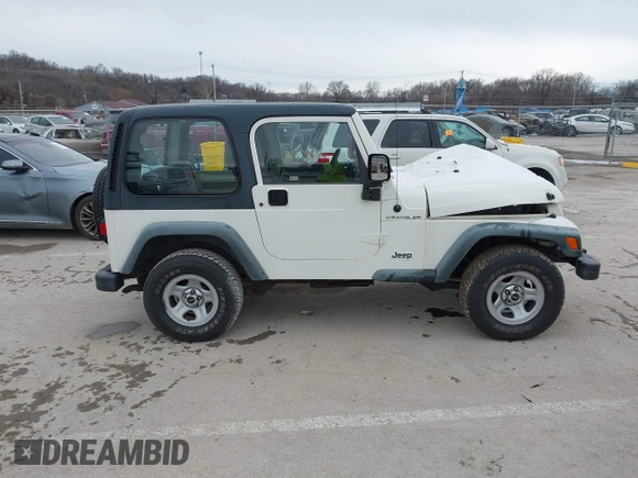 1998 Jeep Wrangler SE with VIN 1J4FY29P9WP793260, listed as a IAAI auction lot 41596990 with 90,766 mi miles. Bid and sale history available at carsss.com. Image 13.