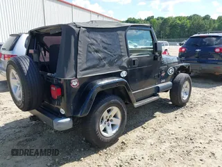 1998 Jeep Wrangler SE with VIN 1J4FY29P5WP793305, listed as a IAAI auction lot 42653372 with 190,047 mi miles and . Bid and sale history available at DreamBid. Image 4.