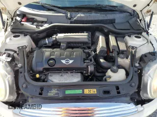 2010 MINI Convertible with VIN WMWMR3C55ATU97172, listed as a Copart auction lot 42726215 with 99,164 mi miles and Salvage Title. Bid and sale history available at DreamBid. Image 11.