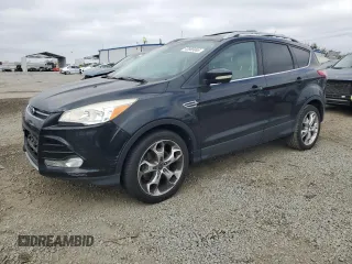 2014 Ford Escape Titanium with VIN 1FMCU9J90EUC89590, listed as a Copart auction lot 43985065 with 128,878 mi miles and Salvage Title. Bid and sale history available at carsss.com. Image 1.
