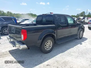 2014 Nissan Frontier SV with VIN 1N6AD0ER8EN725739, listed as a IAAI auction lot 42081008 with 279,407 mi miles and . Bid and sale history available at DreamBid. Image 4.