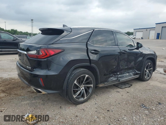 2017 Lexus RX 350 with VIN 2T2BZMCA9HC129460, listed as a Copart auction lot 57301995 with 163,128 mi miles and Salvage title. Bid and sale history available at DreamBid. Image 3.