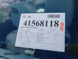 2023 Tesla Model 3 with VIN 5YJ3E1EA6PF495631, listed as a IAAI auction lot 41568118 with 10,073 mi miles and . Bid and sale history available at DreamBid. Image 20.