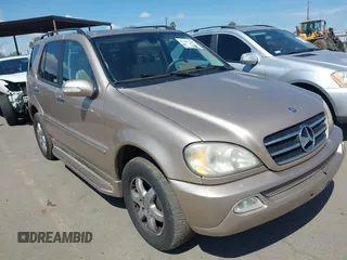 2002 Mercedes-Benz M 320/430/500 with VIN 4JGAB75E52A302663, listed as a IAAI auction lot 41865160 with 231,223 mi miles and . Bid and sale history available at carsss.com. Image 1.