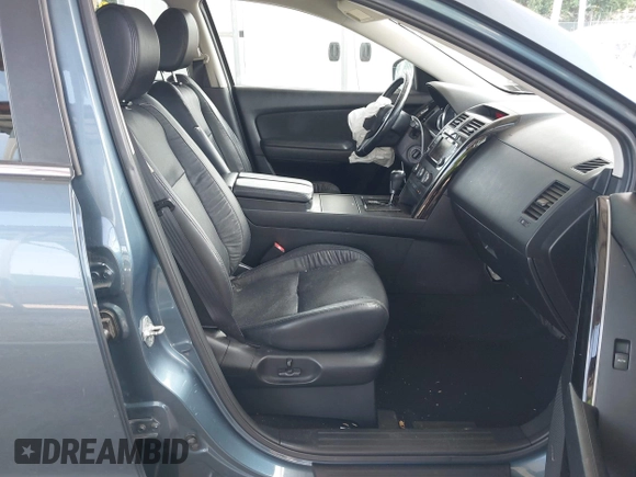 2014 Mazda CX-9 Touring with VIN JM3TB3CV7E0440747, listed as a IAAI auction lot 42457709 with 166,588 mi miles and . Bid and sale history available at DreamBid. Image 5.