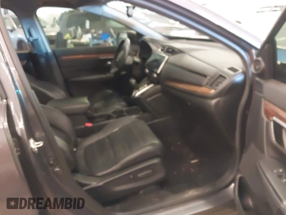 2018 Honda CR-V Touring with VIN 2HKRW2H91JH634457, listed as a IAAI auction lot 41697658 with 101,878 mi miles. Bid and sale history available at carsss.com. Image 5.