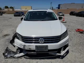 2017 Volkswagen Passat SE with VIN 1VWBT7A30HC013663, listed as a Copart auction lot 58043215 with 76,708 mi miles and Salvage title. Bid and sale history available at DreamBid. Image 5.