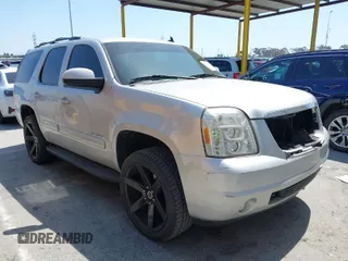 2010 GMC Yukon SLT with VIN 1GKUCCE00AR255901, listed as a IAAI auction lot 41967877 with 195,969 mi miles. Bid and sale history available at carsss.com. Image 1.