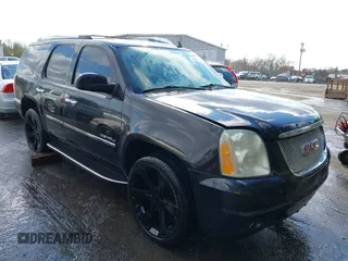 2011 GMC Yukon Denali with VIN 1GKS2EEF6BR257194, listed as a IAAI auction lot 41619864 with 183,057 mi miles. Bid and sale history available at carsss.com. Image 1.
