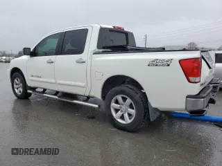 2010 Nissan Titan LE with VIN 1N6AA0EC3AN314733, listed as a Copart auction lot 81301574 with 120,683 mi miles and Salvage Title. Bid and sale history available at carsss.com. Image 2.