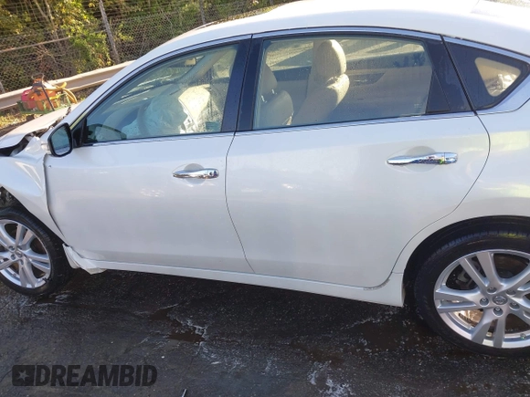 2013 Nissan Altima SV with VIN 1N4BL3AP8DC212068, listed as a IAAI auction lot 42022858 with 67,177 mi miles and . Bid and sale history available at DreamBid. Image 14.