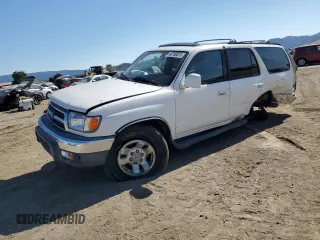 2000 Toyota 4Runner SR5 with VIN JT3HN86R6Y0315376, listed as a Copart auction lot 65780075 with 183,170 mi miles and Salvage title. Bid and sale history available at DreamBid. Image 1.