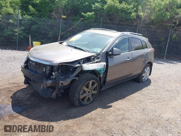 2011 Cadillac SRX Premium Collection with VIN 3GYFNFEY7BS519548, listed as a IAAI auction lot 42097305 with 124,083 mi miles and . Bid and sale history available at DreamBid. Image 2.