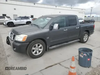 2004 Nissan Titan LE with VIN 1N6AA07A74N533257, listed as a Copart auction lot 57057055 with 312,392 mi miles and Salvage title. Bid and sale history available at DreamBid. Image 1.