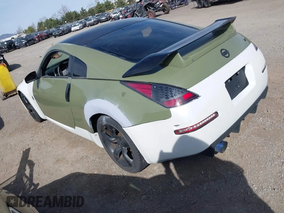 2005 Nissan 350Z Touring with VIN JN1AZ34D25M602913, listed as a IAAI auction lot 41692177 with 210,663 mi miles and . Bid and sale history available at DreamBid. Image 3.