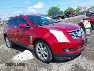 2015 Cadillac SRX Performance Collection with VIN 3GYFNFE36FS638976, listed as a IAAI auction lot 42374566 with 124,182 mi miles and . Bid and sale history available at DreamBid. Image 1.