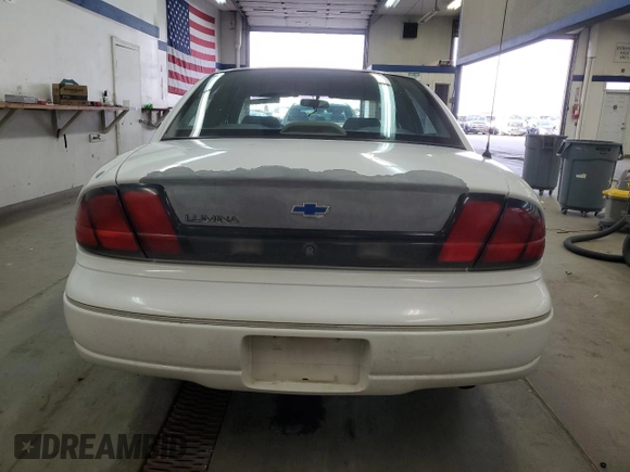 1996 Chevrolet Lumina LS with VIN 2G1WL52MXT1153999, listed as a Copart auction lot 81385634 with 176,573 mi miles and Salvage Title. Bid and sale history available at DreamBid. Image 6.