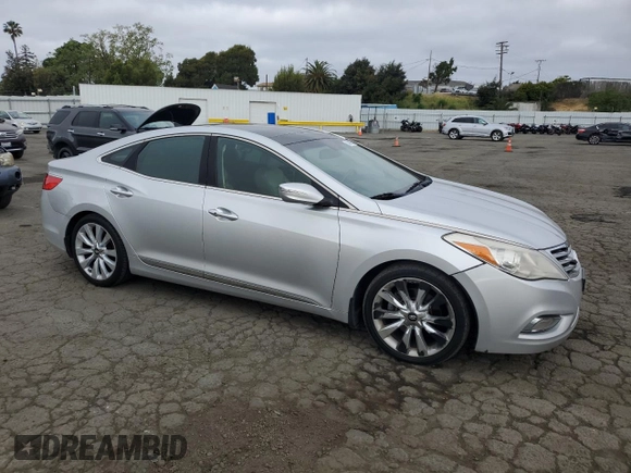 2012 Hyundai Azera z VIN KMHFH4JGXCA123949, wystawiony jako Copart lot #53499005 z przebiegiem 184 083 mil mil oraz Czysty tytuł • Clean title. Historia ofert i sprzedaży dostępna na DreamBid. Obrazek 4.