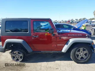 2010 Jeep Wrangler Rubicon with VIN 1J4BA6D17AL126068, listed as a IAAI auction lot 41319076 with 158,888 mi miles and . Bid and sale history available at DreamBid. Image 13.