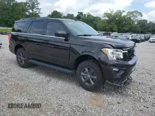 2021 Ford Expedition XLT with VIN 1FMJU1HT0MEA03496, listed as a Copart auction lot 57911685 with 96,462 mi miles and Salvage title. Bid and sale history available at DreamBid. Image 4.
