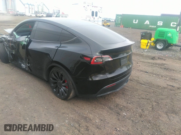 2022 Tesla Model Y Performance with VIN 7SAYGDEF6NF530388, listed as a IAAI auction lot 39253462 with 21,393 mi miles and . Bid and sale history available at DreamBid. Image 3.