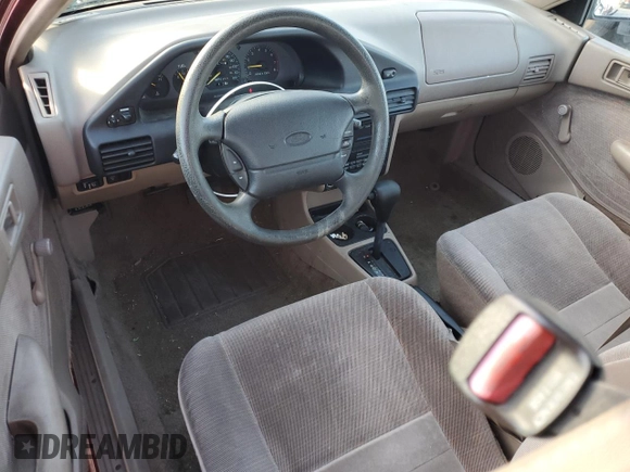 1996 Ford Escort z VIN 1FASP15J7TW112703, wystawiony jako Copart lot #84905564 z przebiegiem 119 575 mil mil oraz Szkoda całkowita • Salvage title. Historia ofert i sprzedaży dostępna na DreamBid. Obrazek 8.