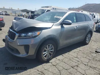 2019 Kia Sorento LX z VIN 5XYPG4A39KG537473, wystawiony jako Copart lot #59040155 z przebiegiem 67 670 mil mil oraz Szkoda całkowita • Salvage title. Historia ofert i sprzedaży dostępna na DreamBid. Obrazek 1.