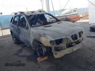 2003 BMW X5 3.0i with VIN 5UXFA53543LV73710, listed as a IAAI auction lot 41969702 with 1 mi miles. Bid and sale history available at carsss.com. Image 1.