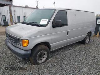2005 Ford Econoline Cargo with VIN 1FTRE14W85HA67080, listed as a IAAI auction lot 40910996 with 599,247 mi miles. Bid and sale history available at carsss.com. Image 2.