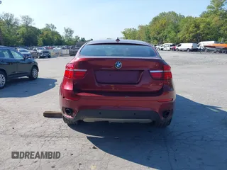 2014 BMW X6 xDrive35i z VIN 5UXFG2C57E0C44052, wystawiony jako IAAI lot #40231766 z przebiegiem 131 573 mil mil oraz . Historia ofert i sprzedaży dostępna na DreamBid. Obrazek 17.