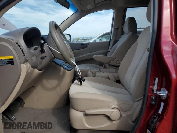 2011 Kia Sedona LX with VIN KNDMG4C72B6369858, listed as a Copart auction lot 70339124 with 165,640 mi miles and Salvage Title. Bid and sale history available at carsss.com. Image 7.