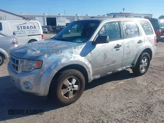 2010 Ford Escape XLT with VIN 1FMCU0D7XAKD16869, listed as a IAAI auction lot 41884141 with 145,781 mi miles. Bid and sale history available at carsss.com. Image 2.