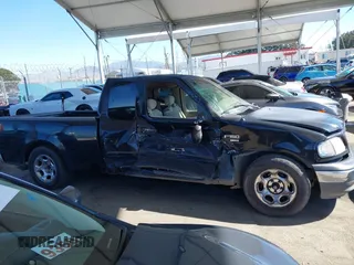2002 Ford F-150 XL with VIN 1FTRX17WX2NB99454, listed as a IAAI auction lot 41643850 with 180,149 mi miles. Bid and sale history available at carsss.com. Image 13.