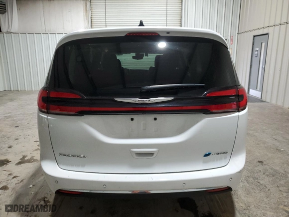 2023 Chrysler Pacifica Hybrid Touring L with VIN 2C4RC1L70PR608758, listed as a Copart auction lot 45183845 with 38,461 mi miles and Salvage Title. Bid and sale history available at carsss.com. Image 6.