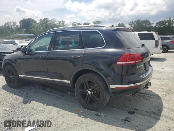 2017 Volkswagen Touareg Wolfsburg Edition with VIN WVGRF7BP6HD004806, listed as a Copart auction lot 61754565 with 160,012 mi miles and Clean title. Bid and sale history available at DreamBid. Image 2.