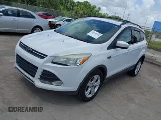 2013 Ford Escape SE with VIN 1FMCU0GX5DUA85464, listed as a IAAI auction lot 42452112 with 158,081 mi miles and . Bid and sale history available at DreamBid. Image 2.