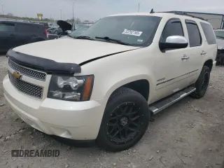 2014 Chevrolet Tahoe LTZ with VIN 1GNSKCE03ER106160, listed as a Copart auction lot 53292765 with 215,535 mi miles and Salvage title. Bid and sale history available at DreamBid. Image 1.