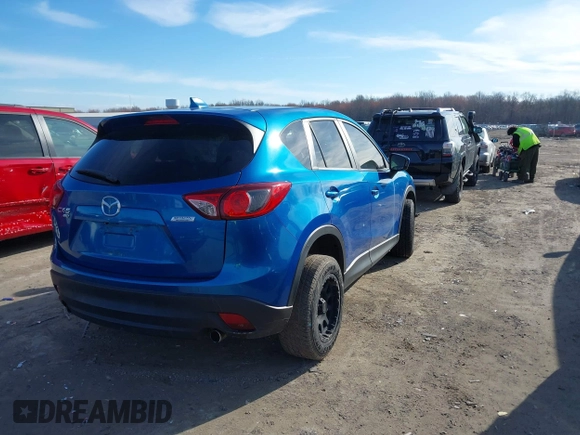 2013 Mazda CX-5 Grand Touring with VIN JM3KE4DE1D0147934, listed as a IAAI auction lot 41869973 with 164,345 mi miles. Bid and sale history available at carsss.com. Image 4.