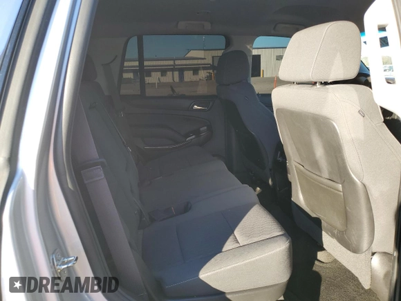 2015 Chevrolet Tahoe LS with VIN 1GNSCAKC1FR643336, listed as a Copart auction lot 47523105 with 113,656 mi miles and Salvage title. Bid and sale history available at DreamBid. Image 11.