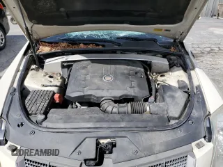 2011 Cadillac CTS Luxury z VIN 1G6DG5EY2B0115035, wystawiony jako Copart lot #55915355 z przebiegiem 144 657 mil mil oraz Szkoda całkowita • Salvage title. Historia ofert i sprzedaży dostępna na DreamBid. Obrazek 11.
