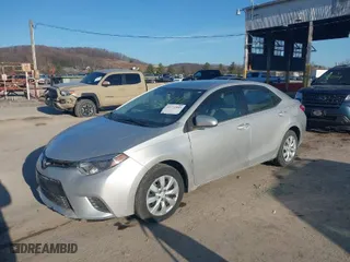 2016 Toyota Corolla L with VIN 5YFBURHE9GP566742, listed as a IAAI auction lot 41771845 with 130,601 mi miles. Bid and sale history available at carsss.com. Image 2.