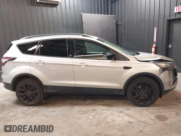 2018 Ford Escape SE z VIN 1FMCU9GD0JUD33111, wystawiony jako IAAI lot #42277404 z przebiegiem 71 896 mil mil oraz . Historia ofert i sprzedaży dostępna na DreamBid. Obrazek 13.