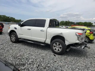 2017 Nissan Titan SV z VIN 1N6AA1EJ2HN570490, wystawiony jako Copart lot #50688785 z przebiegiem 122 817 mil mil oraz Szkoda całkowita • Salvage title. Historia ofert i sprzedaży dostępna na DreamBid. Obrazek 2.