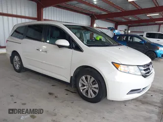2015 Honda Odyssey EX-L with VIN 5FNRL5H64FB084175, listed as a IAAI auction lot 41943540 with 67,902 mi miles and . Bid and sale history available at carsss.com. Image 1.