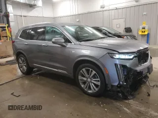 2021 Cadillac XT6 Premium Luxury with VIN 1GYKPFRS3MZ210552, listed as a Copart auction lot 89174415 with 12,823 mi miles and Salvage title. Bid and sale history available at DreamBid. Image 4.