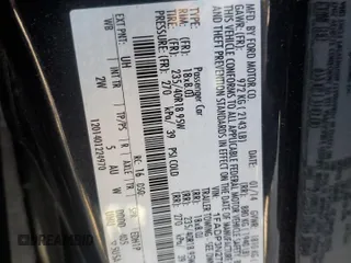 2014 Ford Focus Titanium with VIN 1FADP3N27EL251229, listed as a Copart auction lot 62201195 with 75,534 mi miles and Salvage title. Bid and sale history available at DreamBid. Image 12.