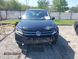2017 Volkswagen Tiguan S with VIN WVGAV7AX7HK021496, listed as a IAAI auction lot 41968240 with 142,980 mi miles and . Bid and sale history available at DreamBid. Image 12.