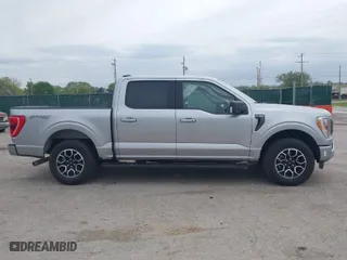 2023 Ford F-150 XL with VIN 1FTFW1E51PFB56848, listed as a IAAI auction lot 42067155 with 56,936 mi miles. Bid and sale history available at carsss.com. Image 13.