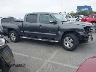2014 Toyota Tacoma PreRunner with VIN 3TMKU4HN9EM041509, listed as a IAAI auction lot 42441194 with 290,715 mi miles and . Bid and sale history available at DreamBid. Image 14.
