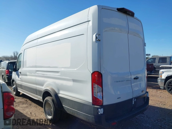 2023 Ford Transit Cargo z VIN 1FTBF4U80PKA47025, wystawiony jako IAAI lot #41715521 z przebiegiem 104 952 mil mil oraz . Historia ofert i sprzedaży dostępna na DreamBid. Obrazek 3.